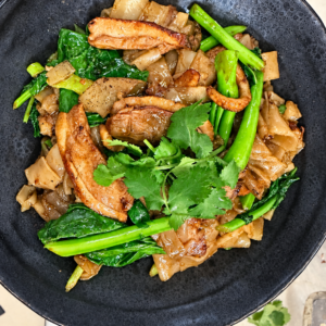 Stir fry flat noodle with Roast Duck Breast, Basil, Chinese Broccoli